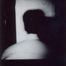 Autoportrait, dos, tirage, sténopé, 2000.
